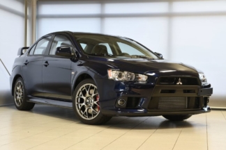A subasta este Mitsubishi Lancer EVO X de 2014 con solo 62 kilómetros subasta mistusibhi lancer evo x 2014